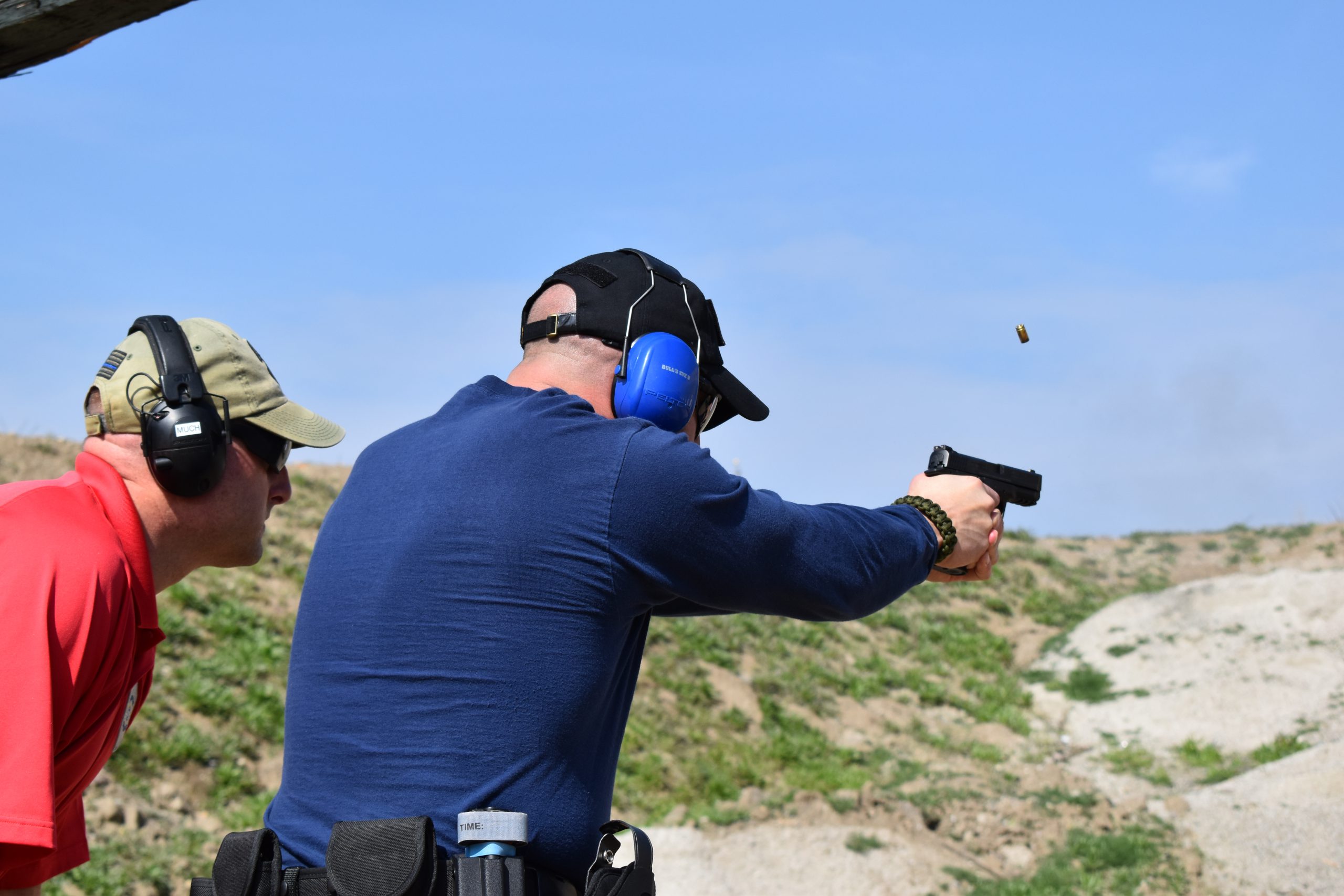 Security officers training at outside gun range