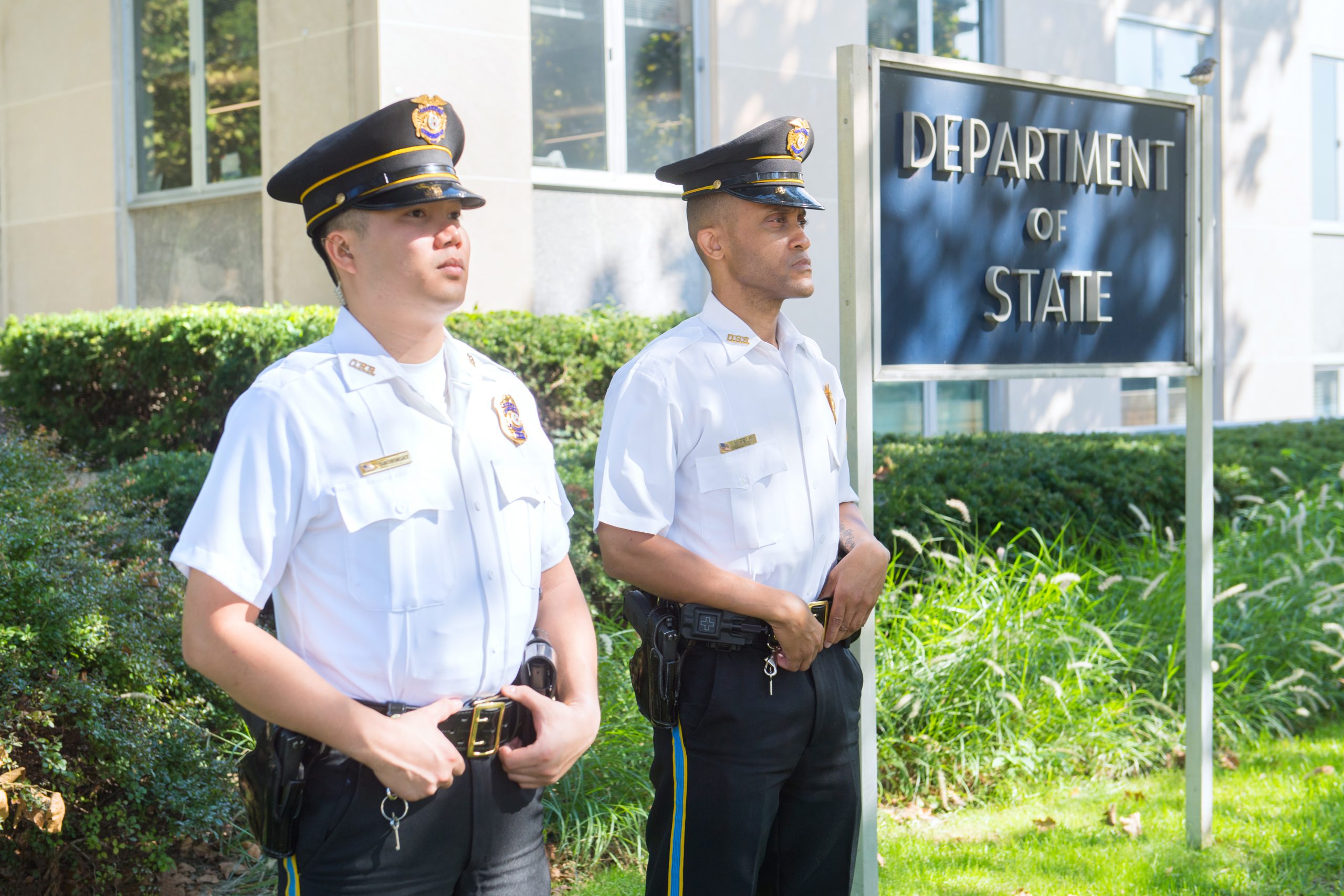Security Officers standing outside of department of state building